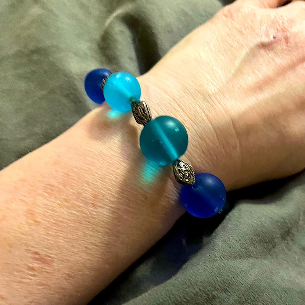 Glass bead bracelet in blues.